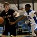 Dexter High School senior Brandon Bellottie drives against a Lincoln defender on Tuesday, Jan. 29. Daniel Brenner I AnnArbor.com